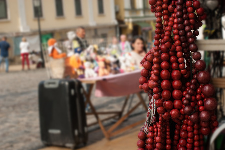 A closeup of ukrainian national jewelry - the red wooden necklace. Concept - necklace is a symbol of woman's beauty, status and weath. The photo was shot at a national fair, Andriyivskyy Descent, Kievの写真素材