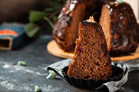 Chocolate cake with berries. bundt cake. Vegan cake. Birthday cake. Cake with candles. Piece of...