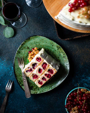 Cherry cake. Traditional russian dessert. Piece of cake. Berries, dessert. Red currant