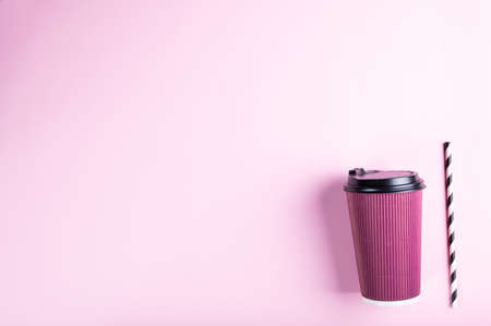 take away coffee cup on colorful paper background. Paper cup flatlay, paper glass flatly. disposable cup. disposable glass. Eco natural cup. Plastic free glass.の写真素材