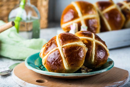 Easter hot cross buns. Traditional dish. Easter dessert. British dessert. Still life of foodの写真素材