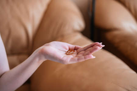 Two wedding rings in women's handsの写真素材