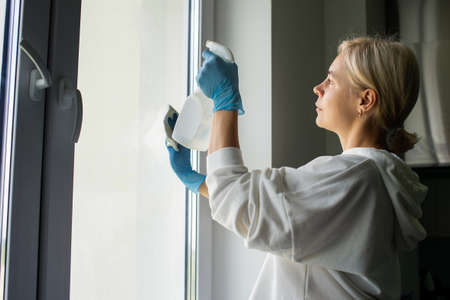 Spray an aerosol to clean the countertop. Wipe the table with a white cloth