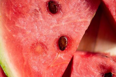 Sliced ripe watermelon with seeds close-upの写真素材