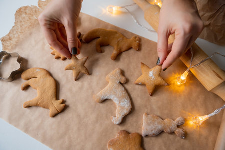 Ready-made Christmas ginger cookies in the hands of a woman