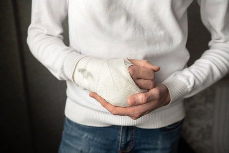 The broken hand of a man in a castの写真素材