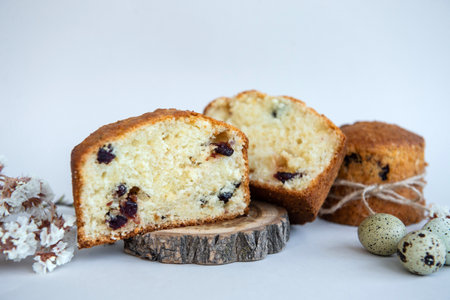 Small Easter pies cut in half, quail eggs, Easter pastry set with raisins, spring religious holidays...