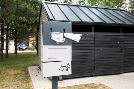 An urn for collecting dog excrement with bagsの写真素材