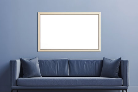 A mock-up of a white painting on a blue wall in a room near the sofaの素材