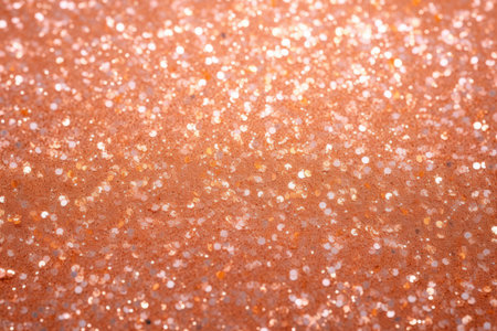 Background image of peach-colored sequins, a place for textの素材