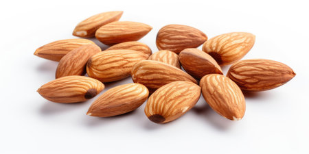 Pile of almond isolated on white backgroundの素材