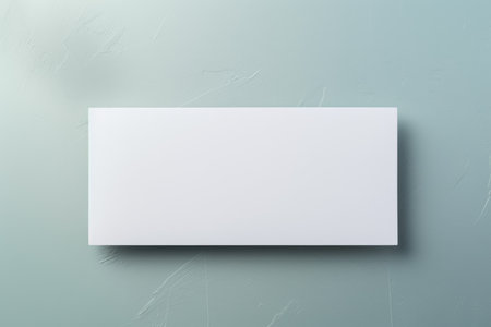White gift card credit card layout lies on the blue background of the tableの素材