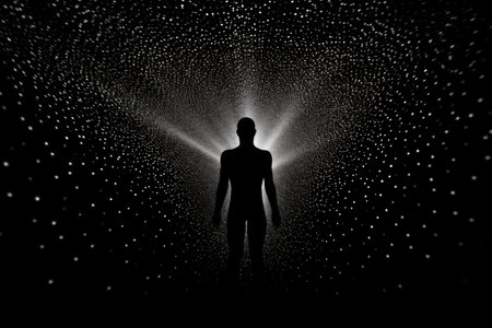 The silhouette of a man standing in a tunnel of dotsの素材