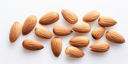 Almonds isolated on white backgroundの素材