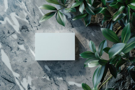 Blank business card mockup with natural elements on granite texture. Close-up shot with copy space for design and printの素材