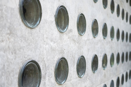 Diagonal perspective of a wall with glass block insertsの写真素材