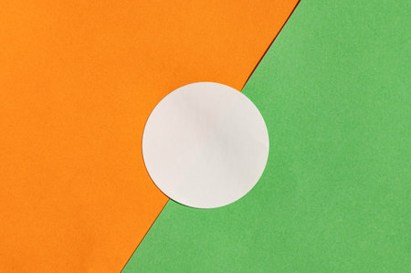 Abstract composition with white circle on orange and green background.の写真素材