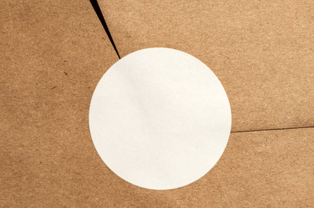 Minimalist brown paper design with white circle center feature.の写真素材