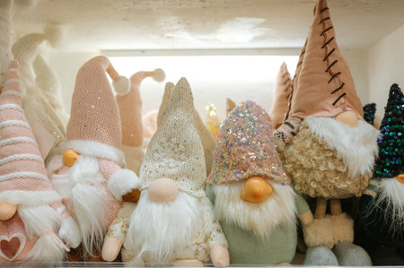 Colorful festive gnomes with knit hats in various colors and patterns.の写真素材
