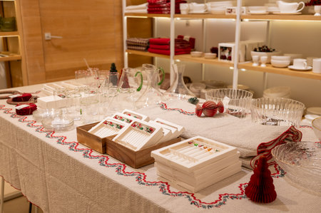 Festive table setting with glassware and holiday decor.の写真素材