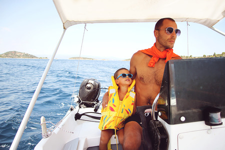 Father and son on boat