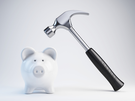 Piggy bank and hammerの写真素材