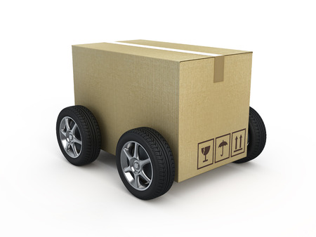 Cardboard box with wheels - shipping conceptの写真素材