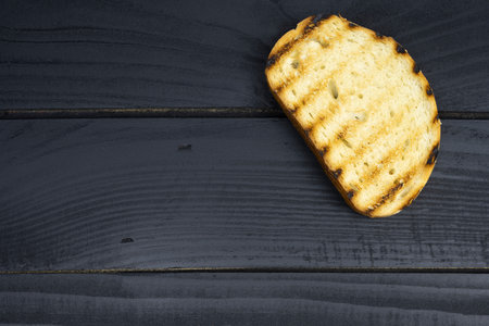 Sliced bread toast on a black background. top viewの写真素材