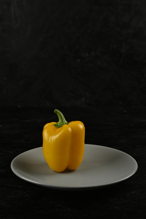 fresh and delicious, yellow peppers black and gray