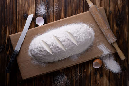 bread flour layout on a wooden board.