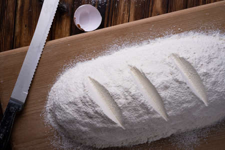 bread flour layout on a wooden board.
