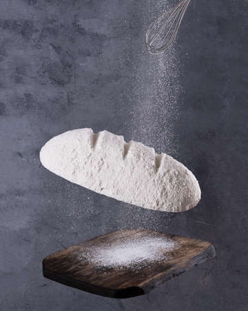 bread flour levitation on a gray background. Concept.