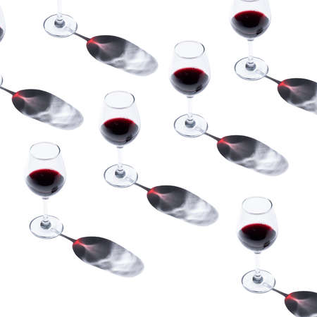 pattern with a glass of red wine on white background.