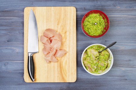 Wooden spoon and ingredients on dark background. Vegetarian food, health or cooking concept.の写真素材