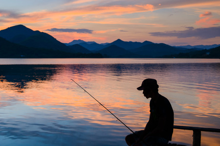 Silhouette fishermanの写真素材
