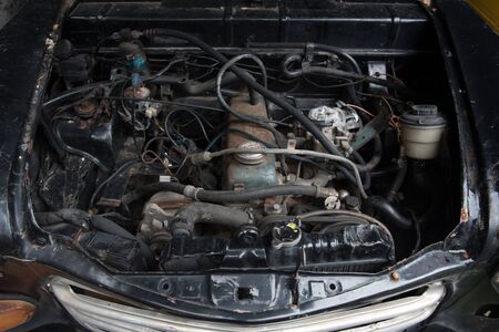 Old car engine Old car engine in junkyardの写真素材