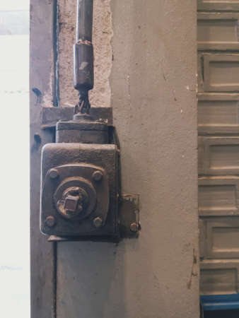 Rustic and Vintage Equipment and Electrical with steel pipe on the dirty cement wall and concrete blocks in studio of buildingの写真素材