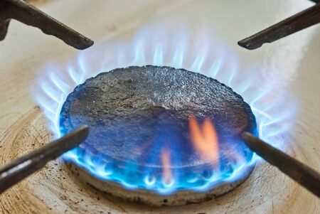 Blue flames from burnerの写真素材