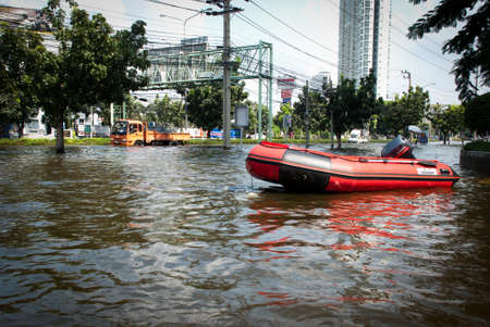 BBANGKOK - NOVEMBER 7 2011:  A new boat dock in front of Siam Commercial Bank headquarter after impact with heaviest flood and rain in 20 years in the capital on November 07, 2011 in Bangkok, Thailand.のeditorial素材