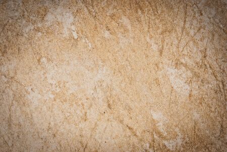 Very old and dirty paper taken from top view, useful for background and texture purposesの写真素材