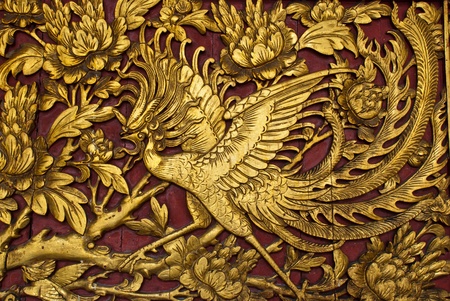 Old phenix golden plate, can be use for background, religion, life, and vilitality conceptsの写真素材