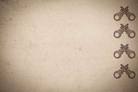 Rusty keys on old paper background with blended layers
の写真素材