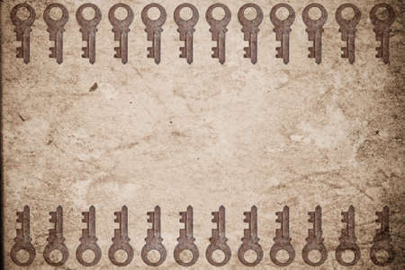 Rusty keys on old paper background with blended layers
の写真素材