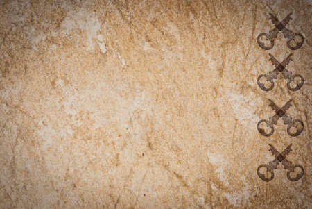 Rusty keys on old paper background with blended layers
の写真素材