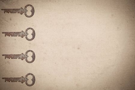 Rusty keys on old paper background with blended layers
の写真素材