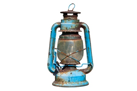 Old rusty oil lamp in isolated white backgroundの写真素材