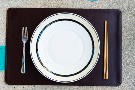General dinner and lunch set with chop stick, can be use for various foods related concept design and background.の写真素材