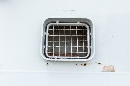 Ship small grey ventilation window, taken on a sunny dayの写真素材