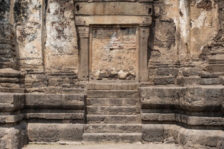 Thailand ancient old temple made from red brick and lime stones, taken on a sunny dayの写真素材