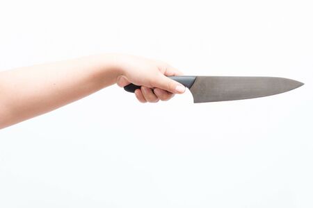 Asian woman holding large knife, isolatedの写真素材